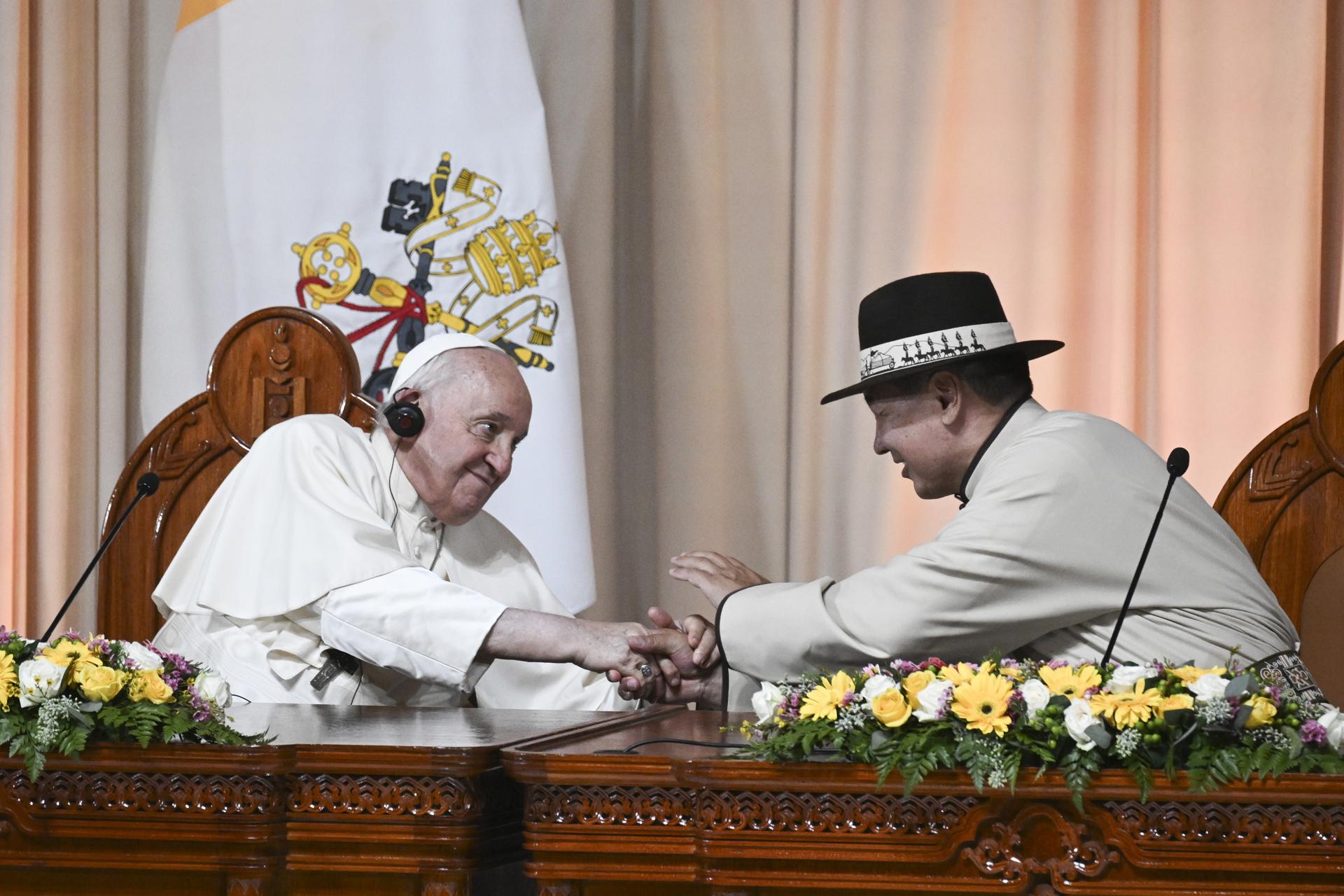 Pope Francis (L) attends a meeting with Mongolian President Ukhnaagiin Khurelsukh at the State Palace in Ulaanbaatar, Mongolia, 02 September 2023. EFE-EPA/CIRO FUSCO