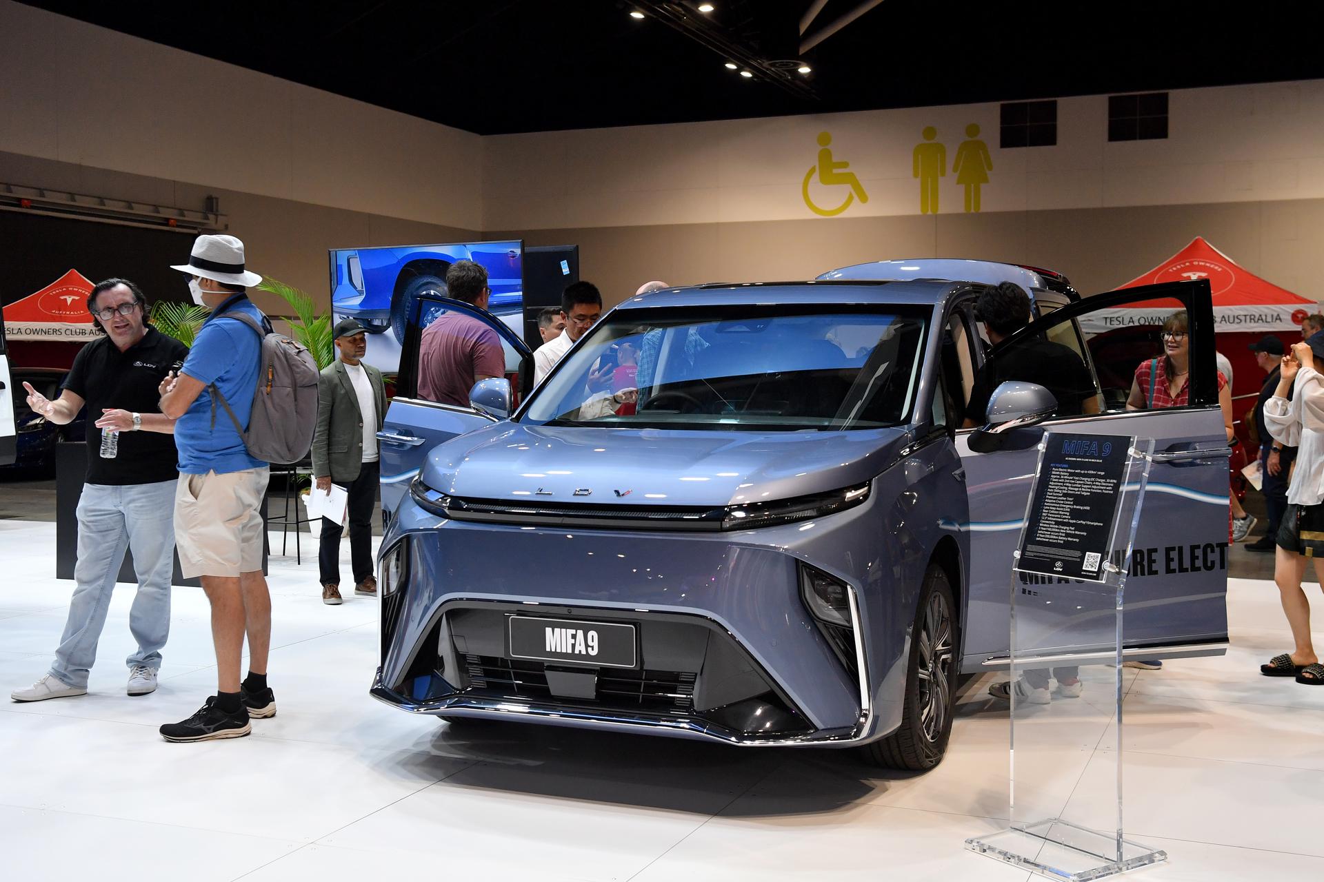 Visitors check an LDV Mifa 9 vehicle at the Fully Charged Live expo, a display of electric vehicles plus home and business energy efficiency schemes in Sydney Australia 11 March 2023. EFE-EPA FILE/BIANCA DE MARCHI AUSTRALIA AND NEW ZEALAND OUT
