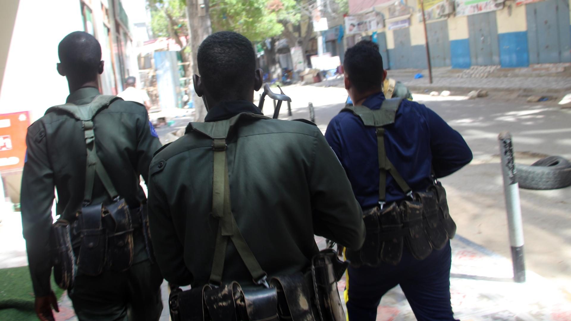 A file photograph of Somali police officers guarding a street in Mogadishu, Somalia. EFE-EPA/FILE/SAID YUSUF WARSAME