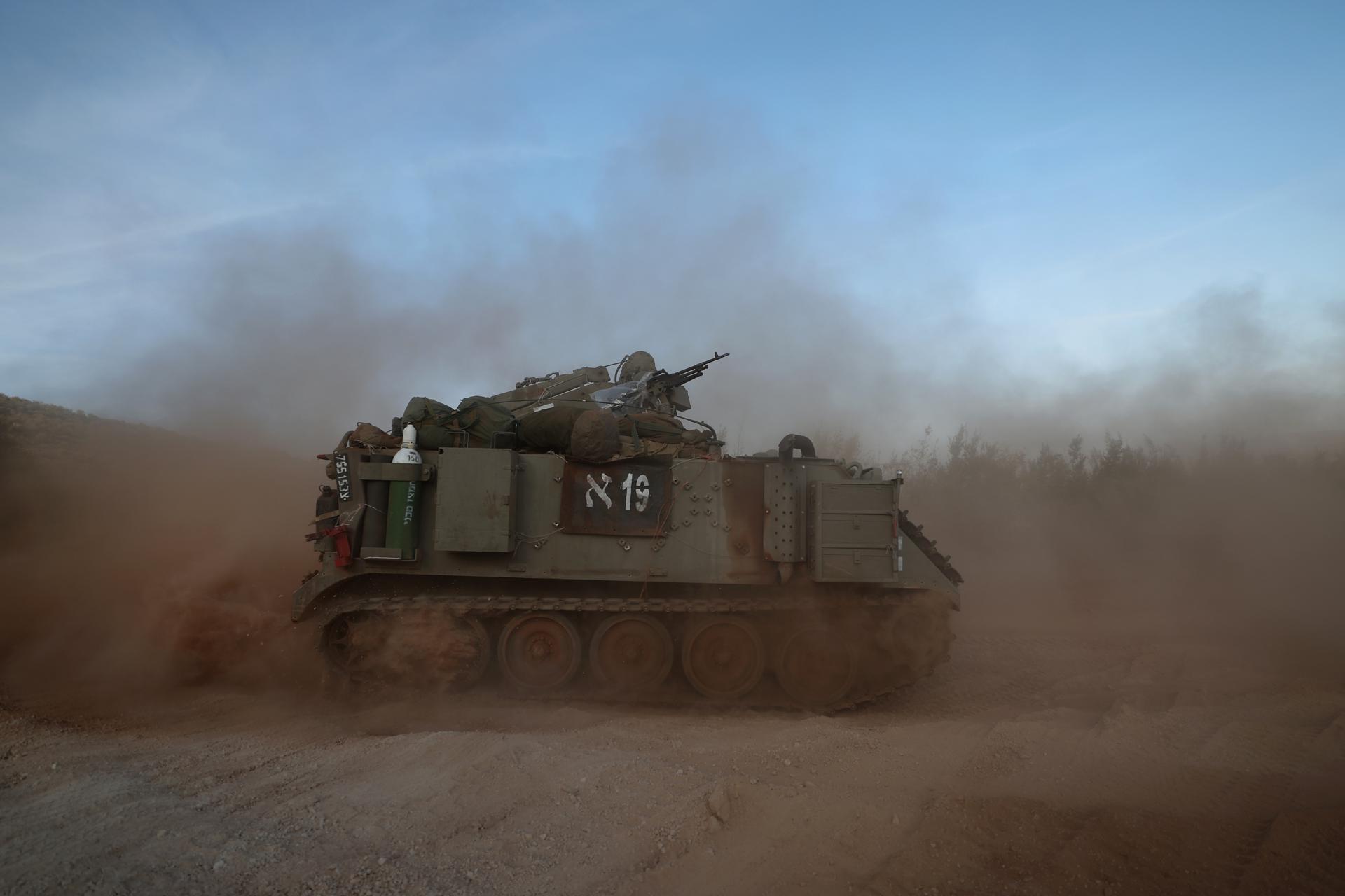 An Israeli APCs during maneuvers at an undisclosed location along the border with Lebanon, in Israel, 26 October 2023.EFE/EPA/ATEF SAFADI