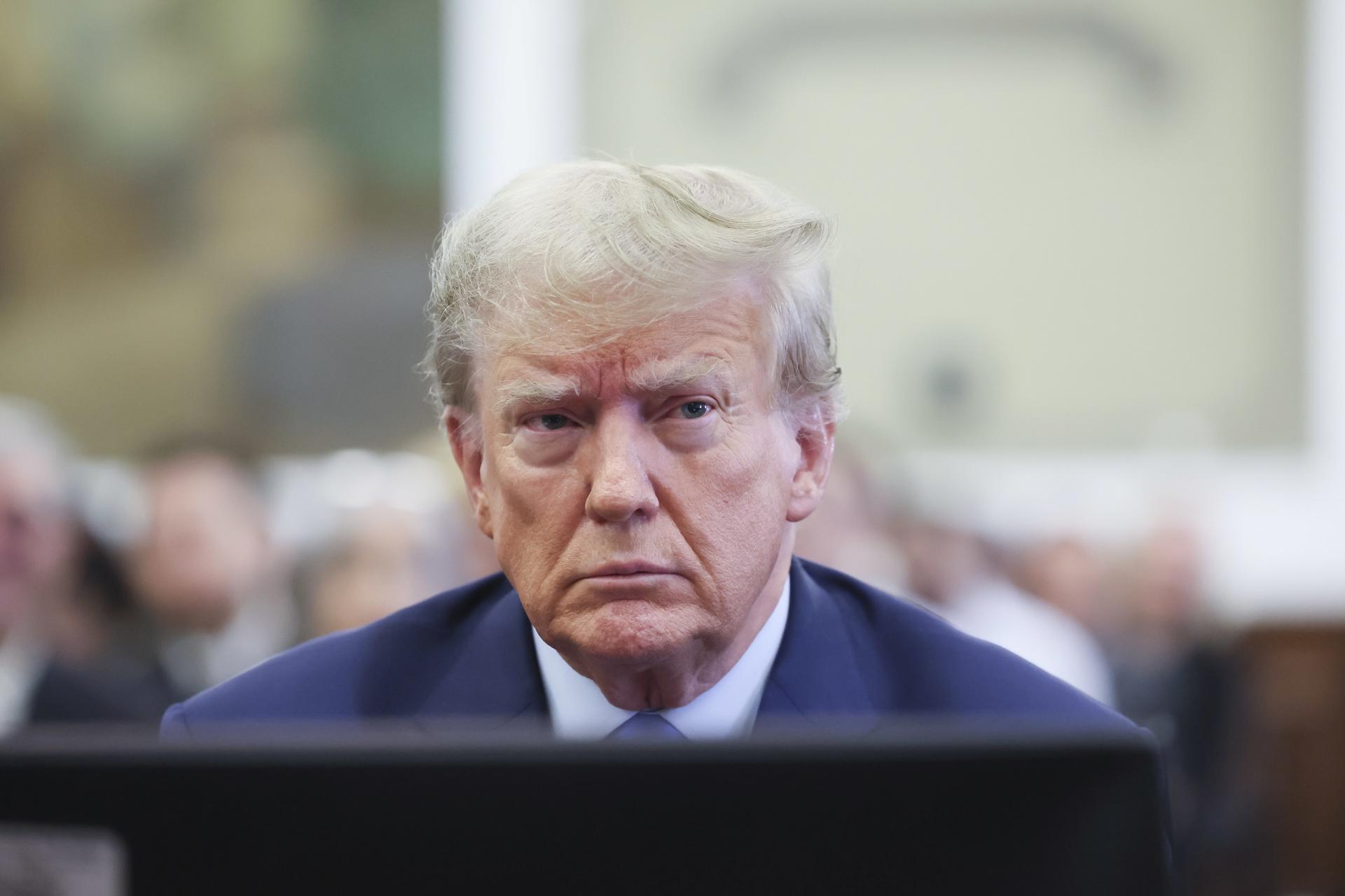 Former US President Donald J. Trump sits in the courtroom as he attends the first day of his civil fraud trial in New York, New York, USA, 02 October 2023. EFE/EPA/BRENDAN MCDERMID / POOL