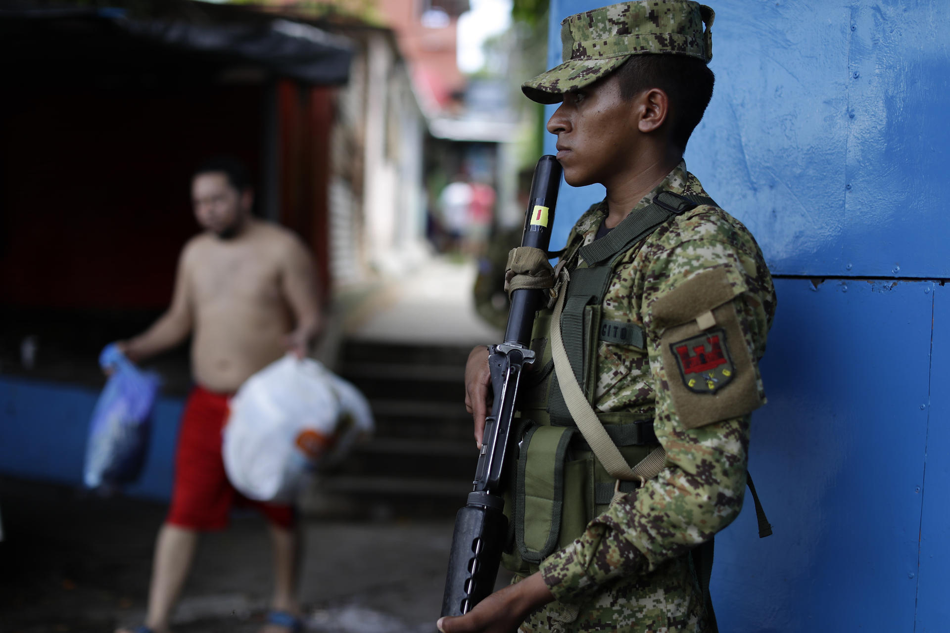 Military patrol urban areas as part of a security perimeter in Apopa, El Salvador, October 11, 2023. EFE/Rodrigo Sura