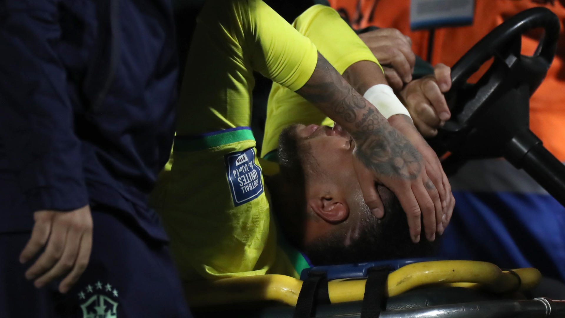 Brazil's Neymar laments while being assisted leaving the field for a possible injury during a FIFA 2026 World Cup qualifiers soccer match between Uruguay and Brazil at Centenario stadium in Montevideo, Uruguay, 17 October 2023. EFE-EPA/Raul Martinez