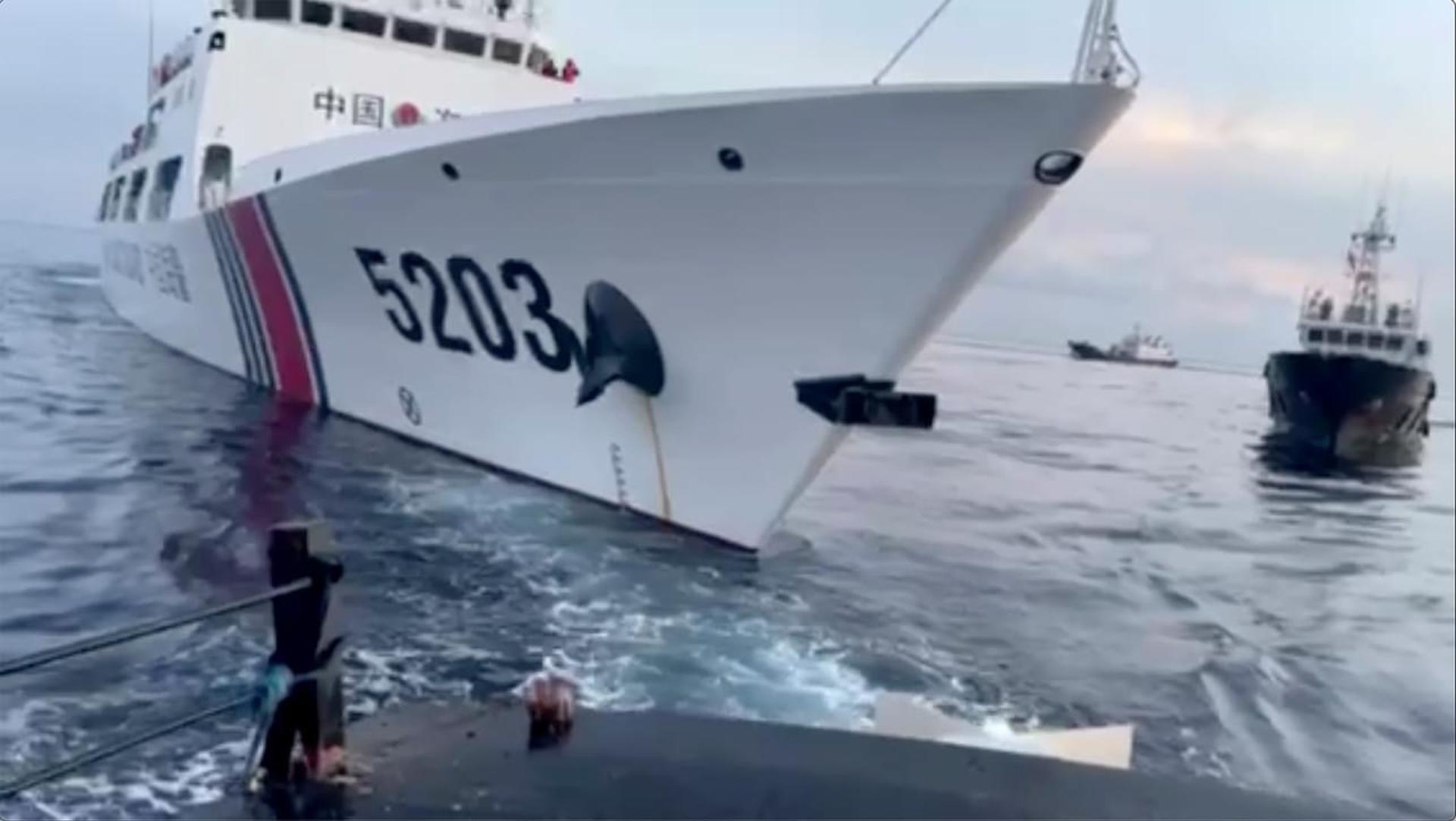A handout frame grab photo from a video made available by the Philippine'Äôs Armed Forces shows a Chinese coast guard ship with bow number 5203 after bumping a Philippine's Armed Forces supply boat as they approach Second Thomas Shoal, locally called Ayungin Shoal, at the disputed South China Sea on 22 October 2023. EFE-EPA/PHILIPPINE'S ARMED FORCES / HANDOUT BEST QUALITY AVAILABLE HANDOUT EDITORIAL USE ONLY/NO SALES HANDOUT EDITORIAL USE ONLY/NO SALES