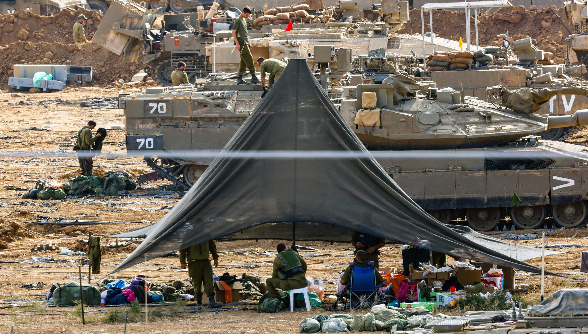 Israeli armored vehicles gathered at an undisclosed location near the border with Gaza, in Israel, 20 October 2023. EFE-EPA/HANNIBAL HANSCHKE
