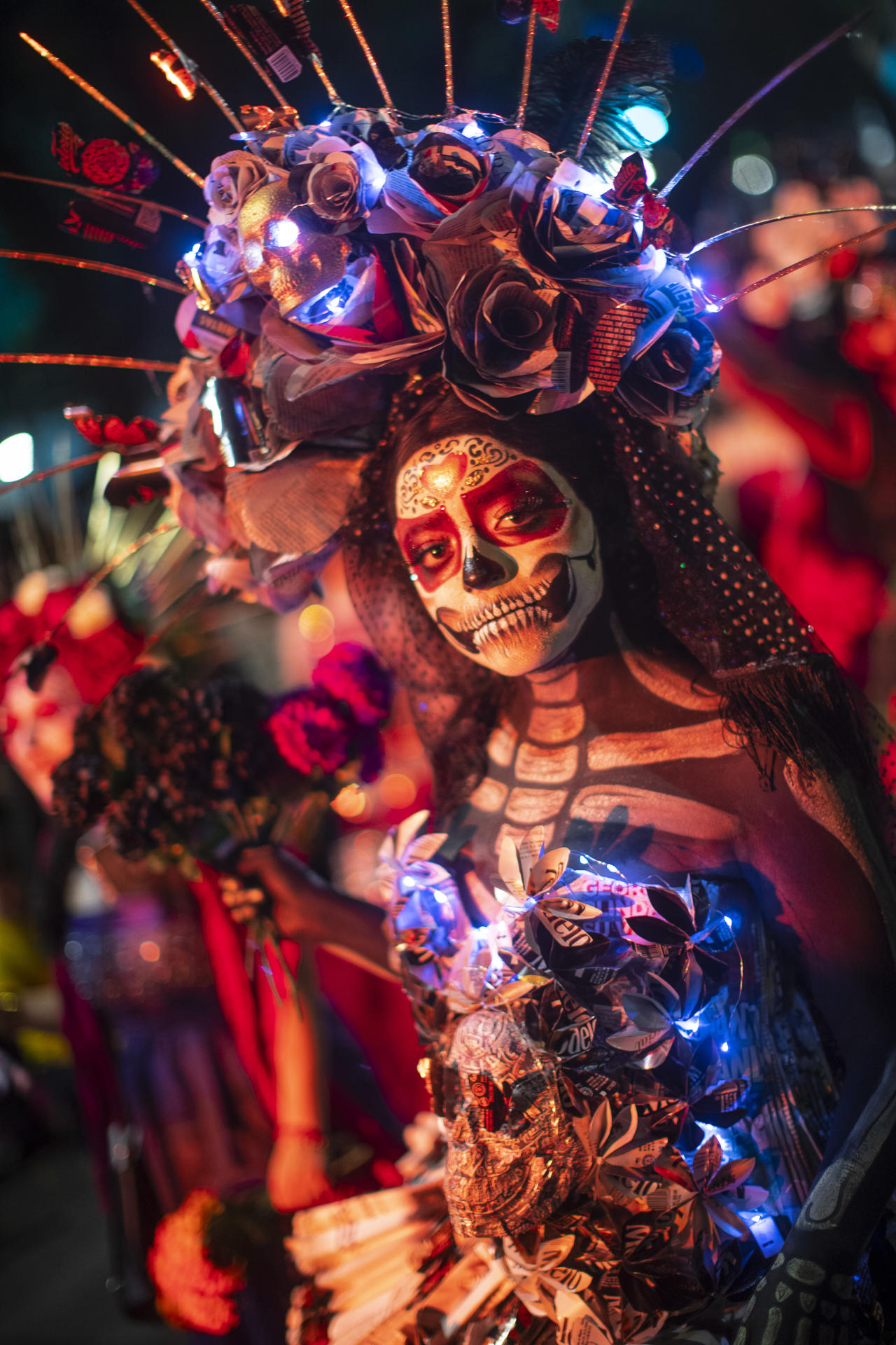 People dressed as Catrinas participate in the Catrinas Procession as part of the celebrations for the Day of the Dead, in Mexico City, Mexico, 22 October 2023. EFE/Isaac Esquivel
