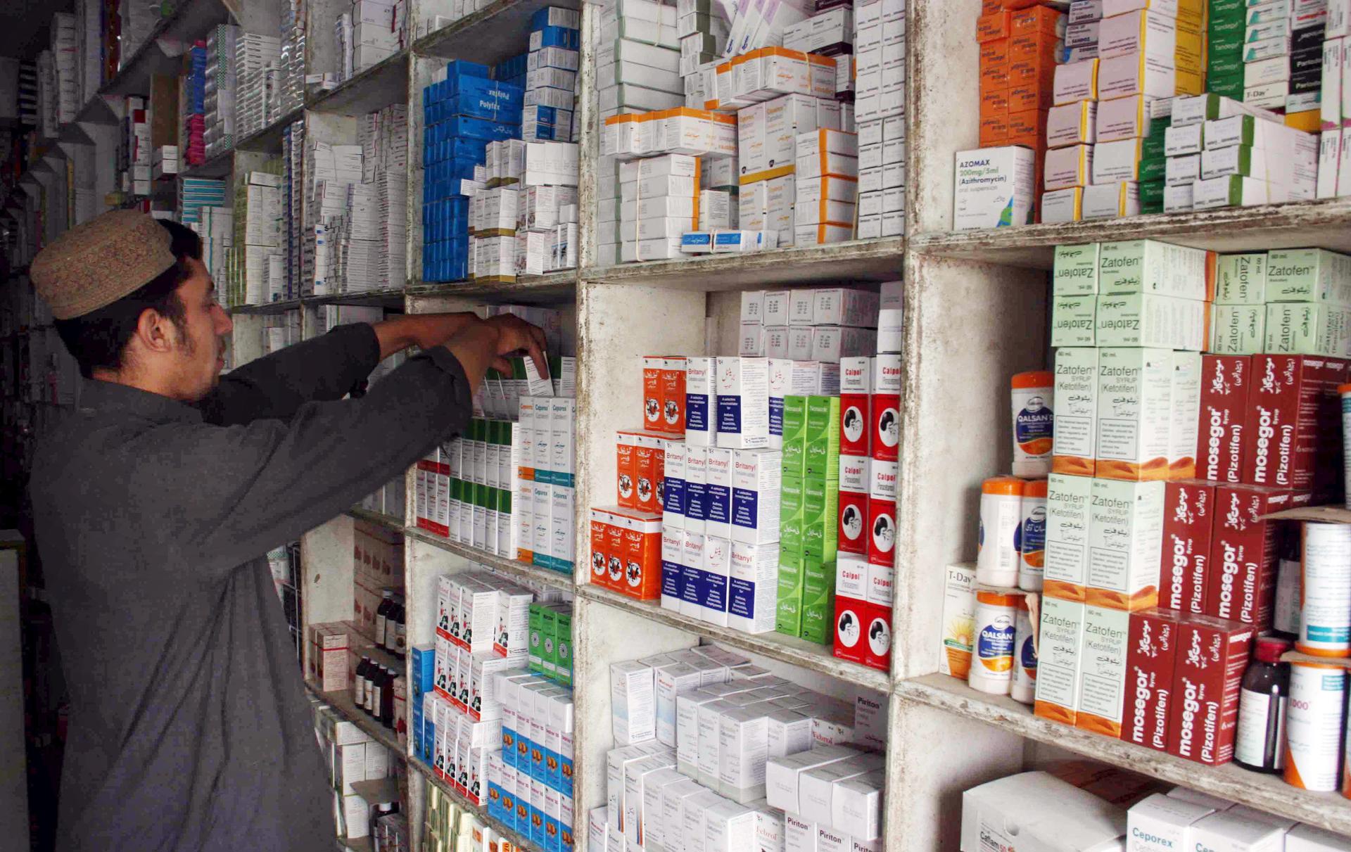 (FILE) A man sells medicine at a shop in the Pakistani town of Chaman, near the Afghan border. EPA/EFE/MATIULLAH ACHAKZAI