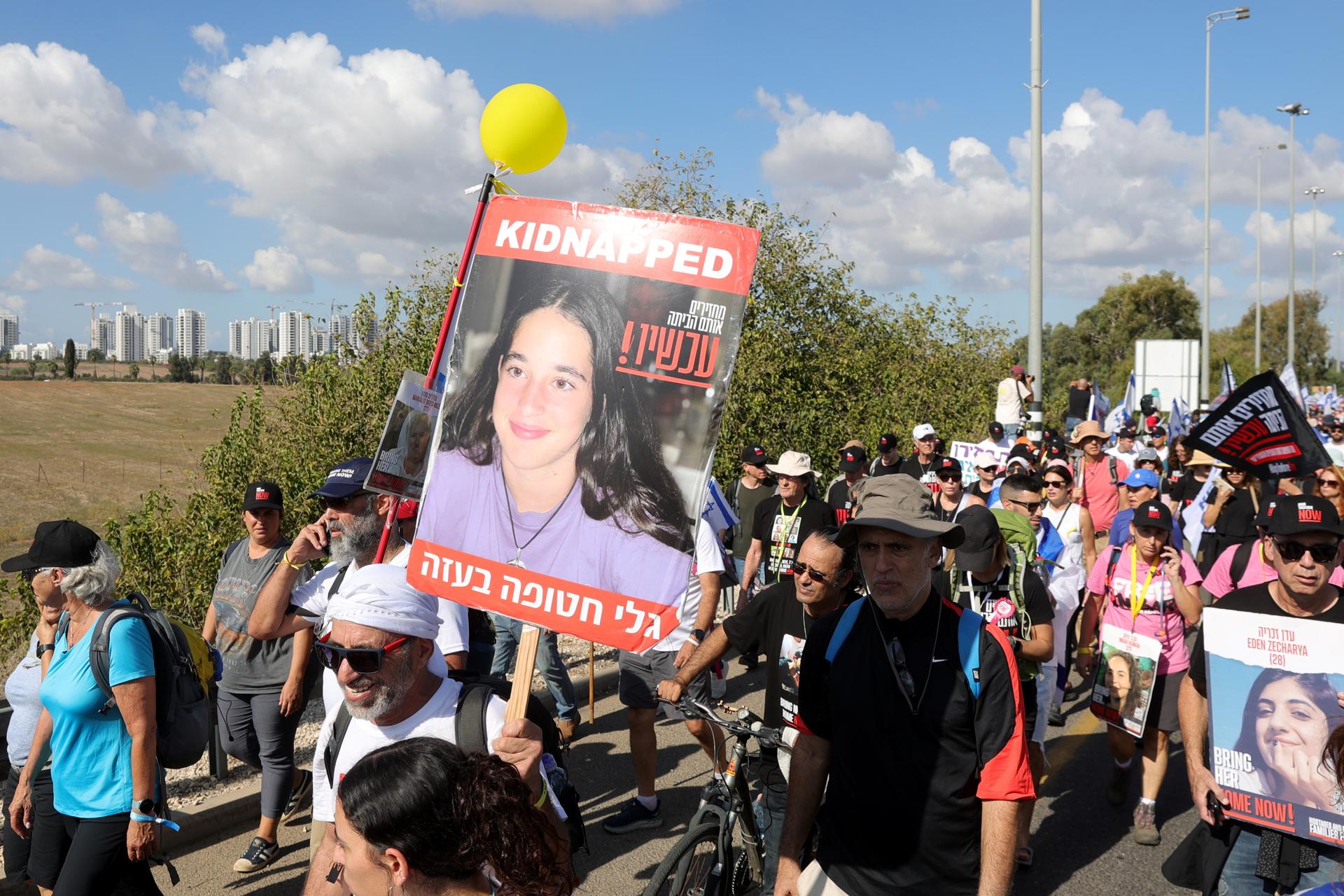Family members, friends and supporters of the hostages held by Hamas in Gaza take part in a march from Tel Aviv to Jerusalem, near Be'er Ya'akov, Israel, 15 November 2023. EFE-EPA/ABIR SULTAN
