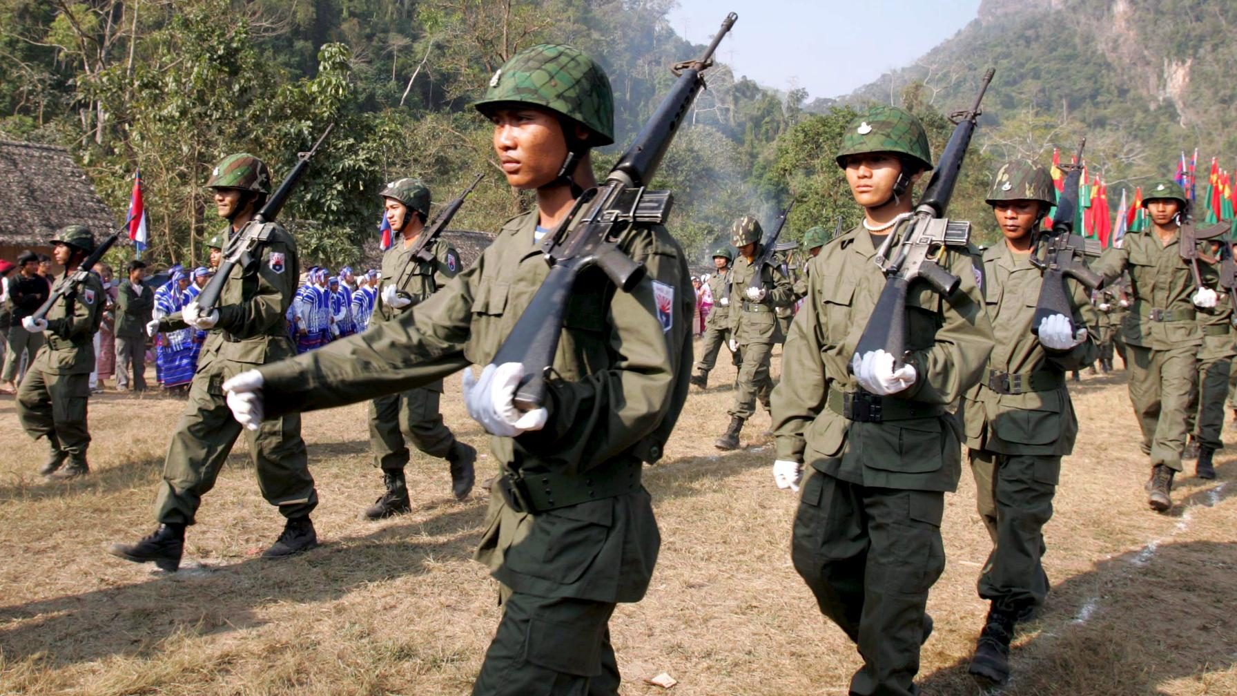 A file photo dated on 31 January 2006 shows Karen National Union (KNU) guerillas as they parade during the 57th anniversary of Karen Resistance Day at the Karen National Union Army rebel jungle stronghold, Mu Aye Pu, Myanmar. EPA/FILE RUNGROJ YONGRIT