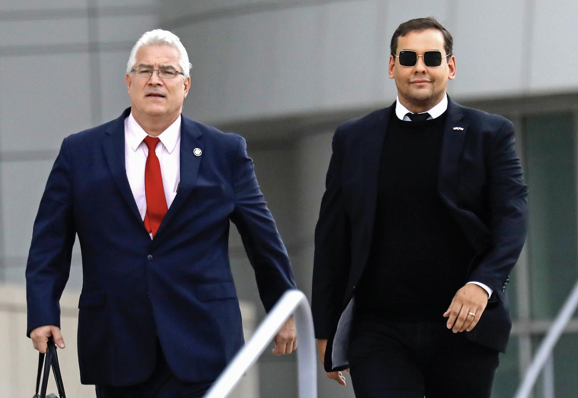 US Republican Representative of New York George Santos (R) walks alongside his attorney Joe Murray (L) as they exit the Federal Court in Central Islip, New York, USA, 27 October 2023. EFE/EPA/PETER FOLEY
