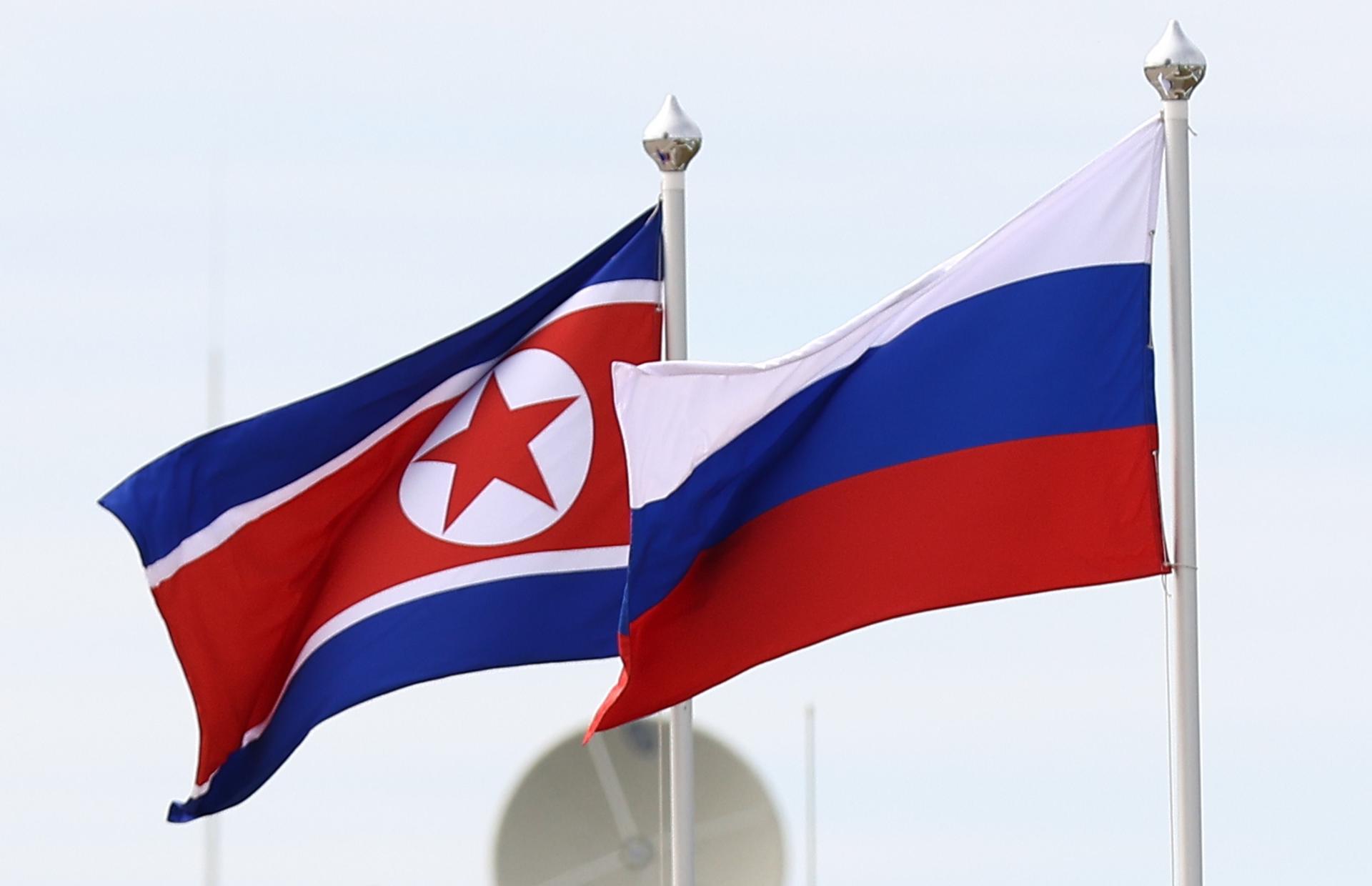 Flags of North Korea (L) and Russia fly during a visit of Russian President Putin and North Korean leader Kim Jong Un to the Vostochny cosmodrome, outside the town of Tsiolkovsky (former Uglegorsk), some 180km north of Blagoveschensk in Amur region, Russia, 13 September 2023. EFE-EPA/ARTEM GEODAKYAN/SPUTNIK/KREMLIN / POOL MANDATORY CREDIT/FILE