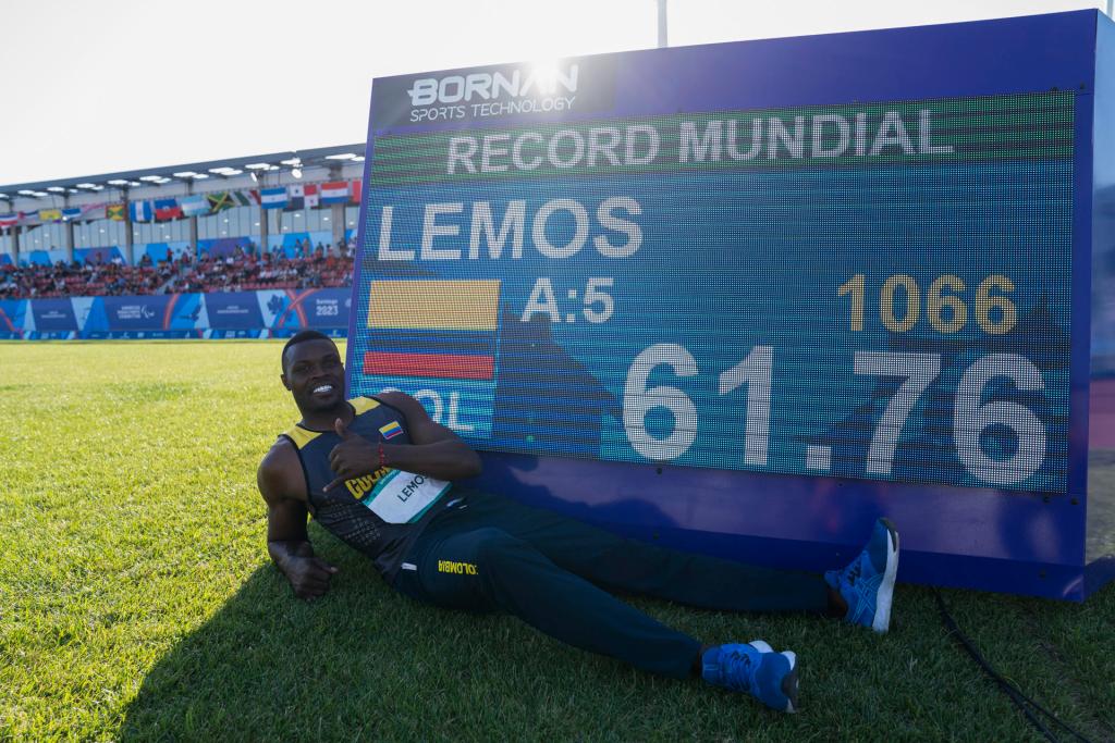 José Gregorio Lemos of Colombia stands next to the board after winning gold and breaking the world record in the men's para athletics javelin F37/38, during the 2023 Parapan American Games, in Santiago (Chile).  EFE / Adriana Tomasa