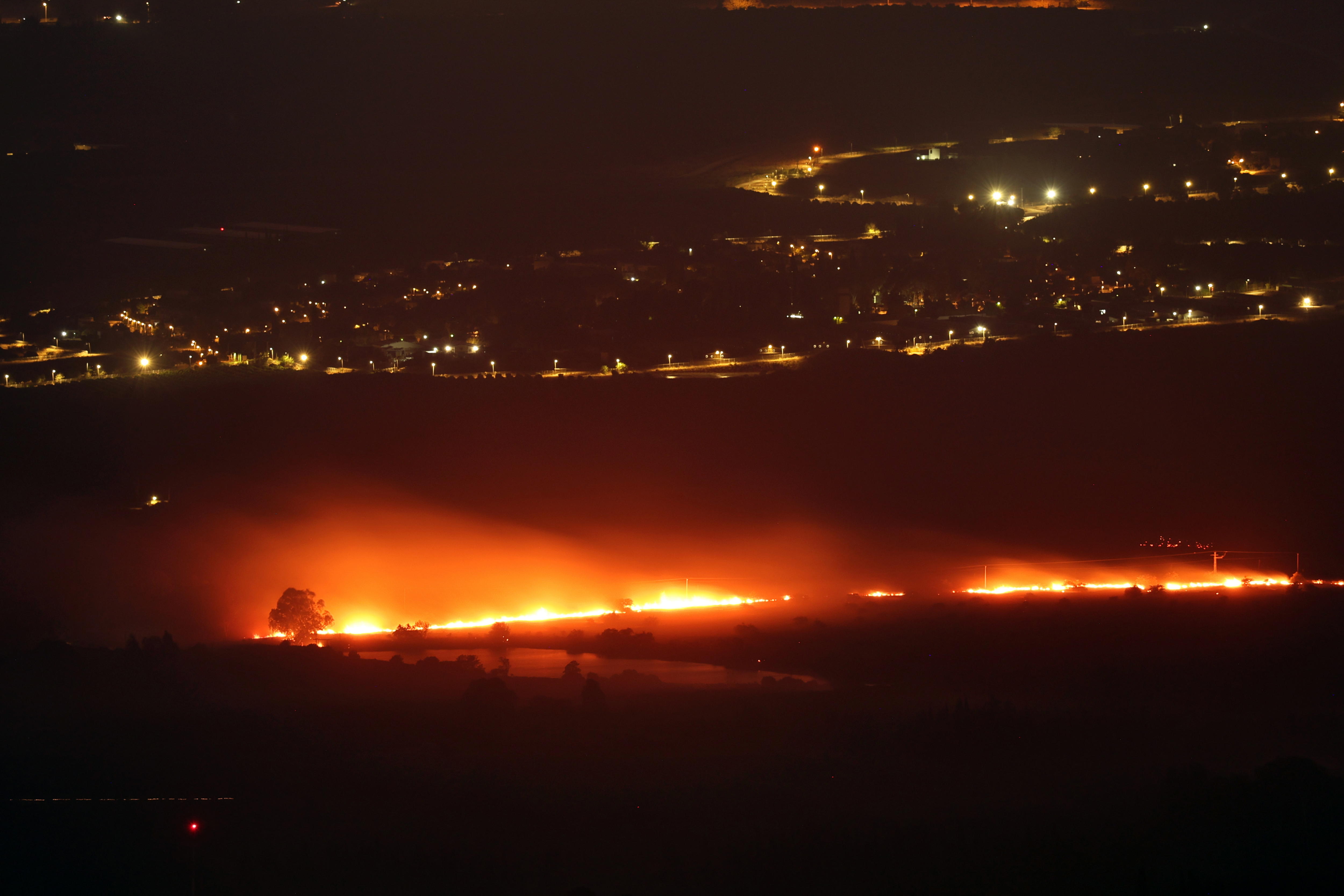 Israel reports Hezbollah attack with 130 projectiles from Lebanon